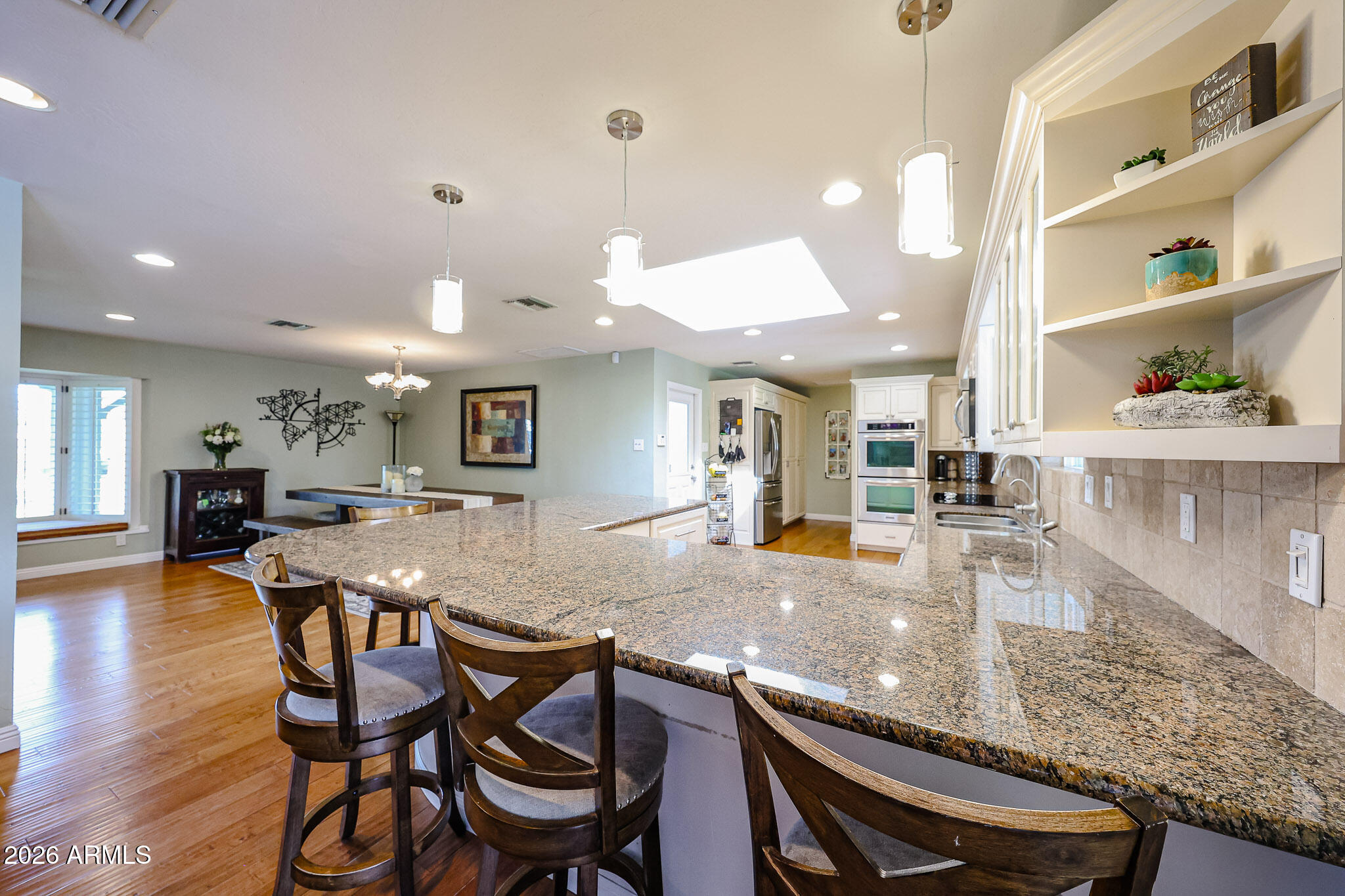 7113 North 8th Avenue Phoenix, AZ 85021 - Photo 20 of 57 a view of a dining room with furniture and wooden floor