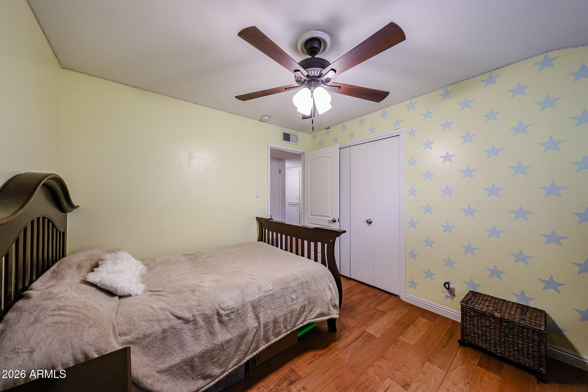 7113 North 8th Avenue Phoenix, AZ 85021 - Photo 42 of 57 a bedroom with a bed and a chandelier