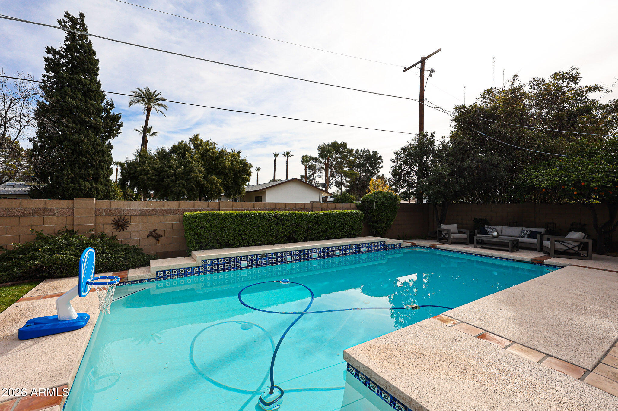 7113 North 8th Avenue Phoenix, AZ 85021 - Photo 50 of 57 a view of a swimming pool with a patio and a yard
