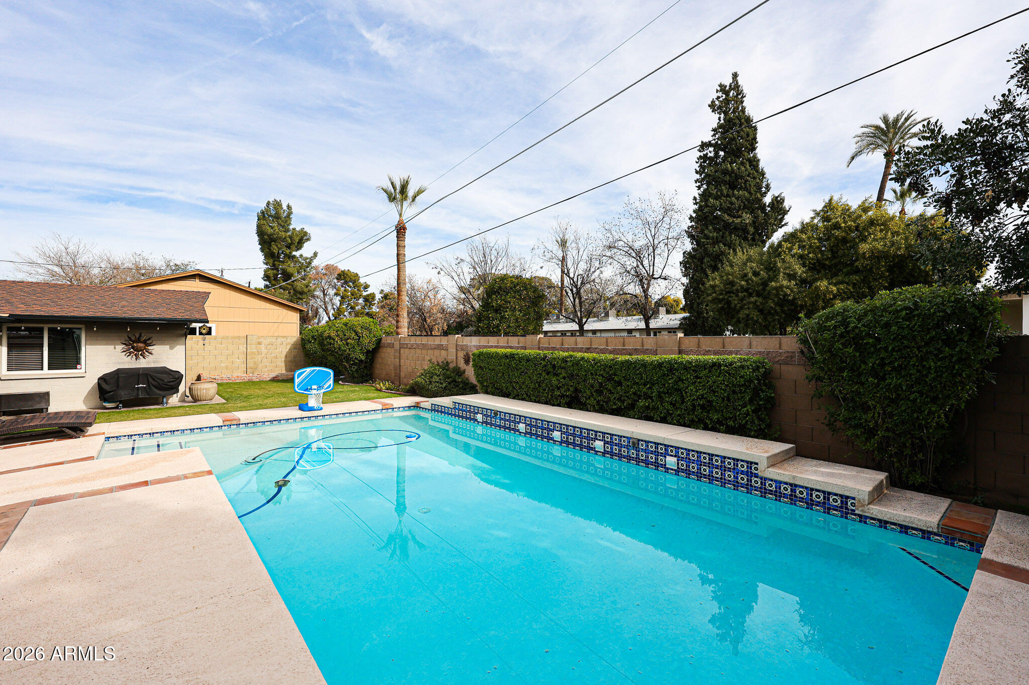 7113 North 8th Avenue Phoenix, AZ 85021 - Photo 51 of 57 a view of a house with pool and a yard