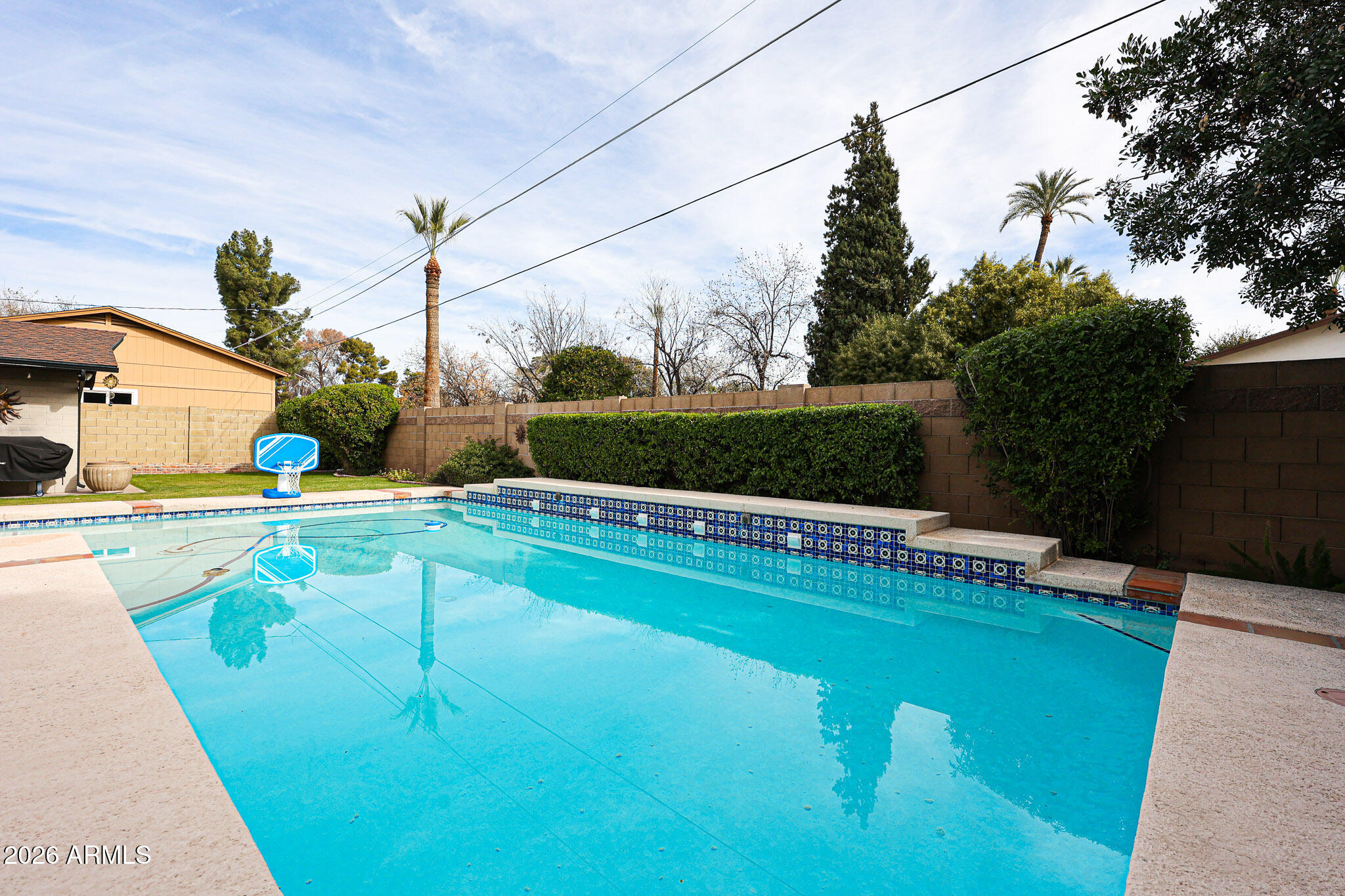 7113 North 8th Avenue Phoenix, AZ 85021 - Photo 52 of 57 a view of a swimming pool with a patio and a yard