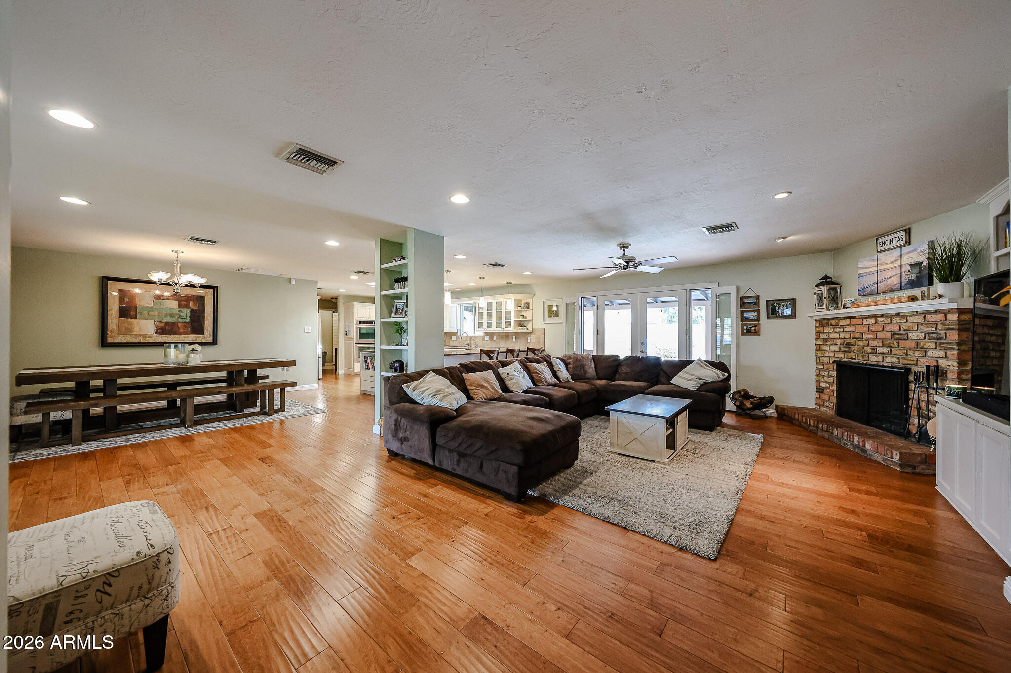 7113 North 8th Avenue Phoenix, AZ 85021 - Photo 8 of 57 a living room with furniture and a fireplace