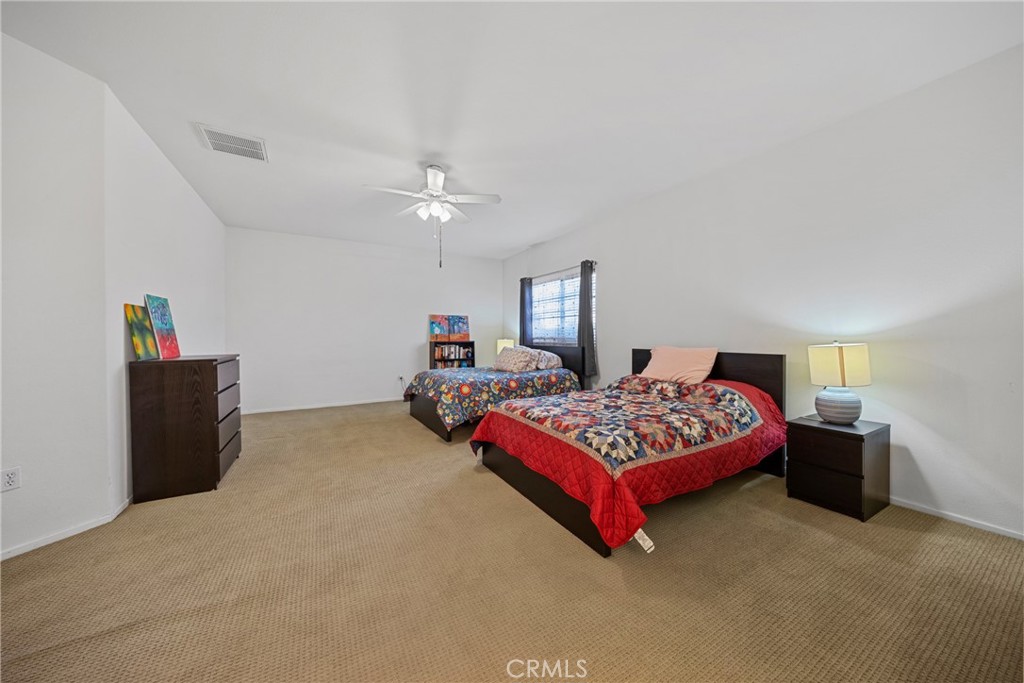 1727 Miranda Lane Beaumont, CA 92223 - Photo 14 of 47 a bedroom with bed and window