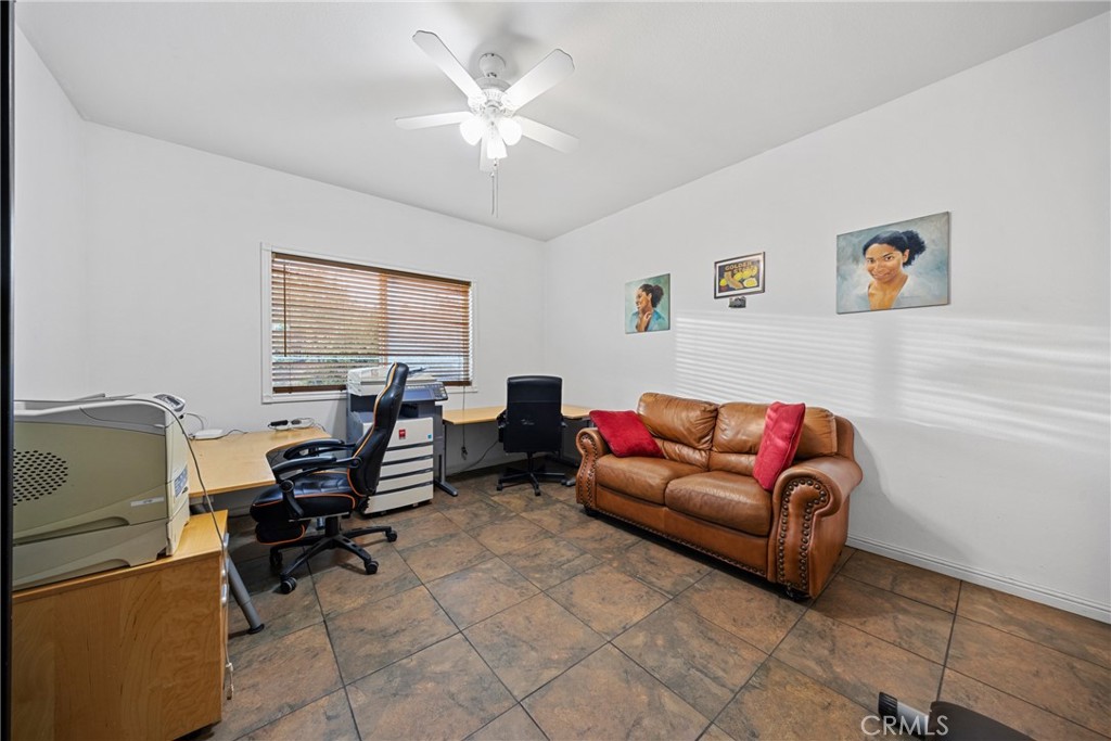 1727 Miranda Lane Beaumont, CA 92223 - Photo 37 of 47 a living room with furniture and a window