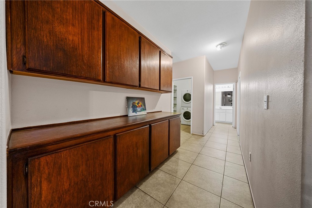 1727 Miranda Lane Beaumont, CA 92223 - Photo 41 of 47 a kitchen with stainless steel appliances a sink and cabinets