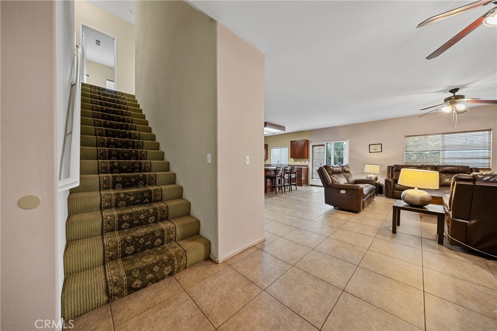 1727 Miranda Lane Beaumont, CA 92223 - Photo 44 of 47 a living room with furniture and a potted plant