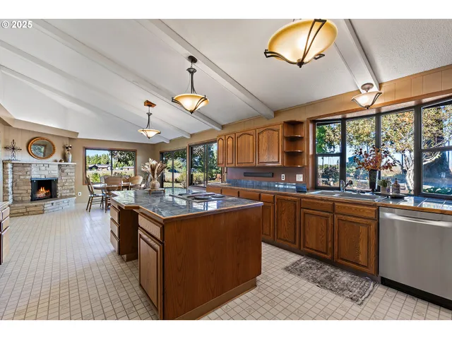 a kitchen with a stove and a sink