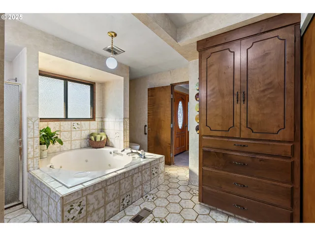 a bathroom with a sink a vanity and a mirror