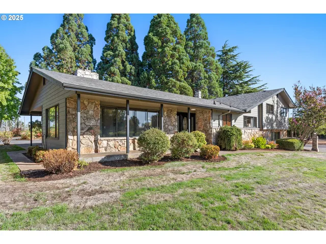 a house view with a garden space