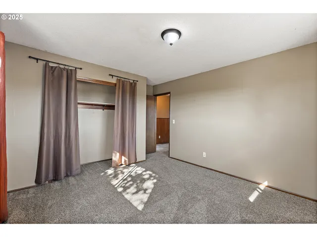 a view of a livingroom with wooden floor