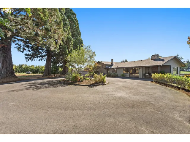 a view of a backyard of a house