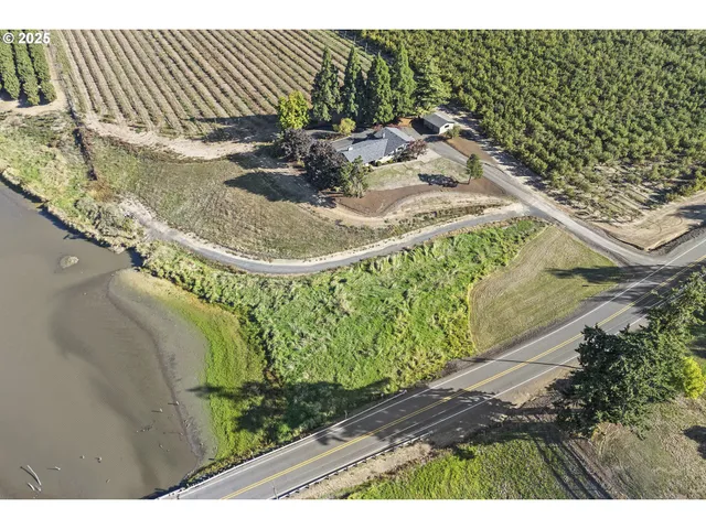 a view of a swimming pool with a yard
