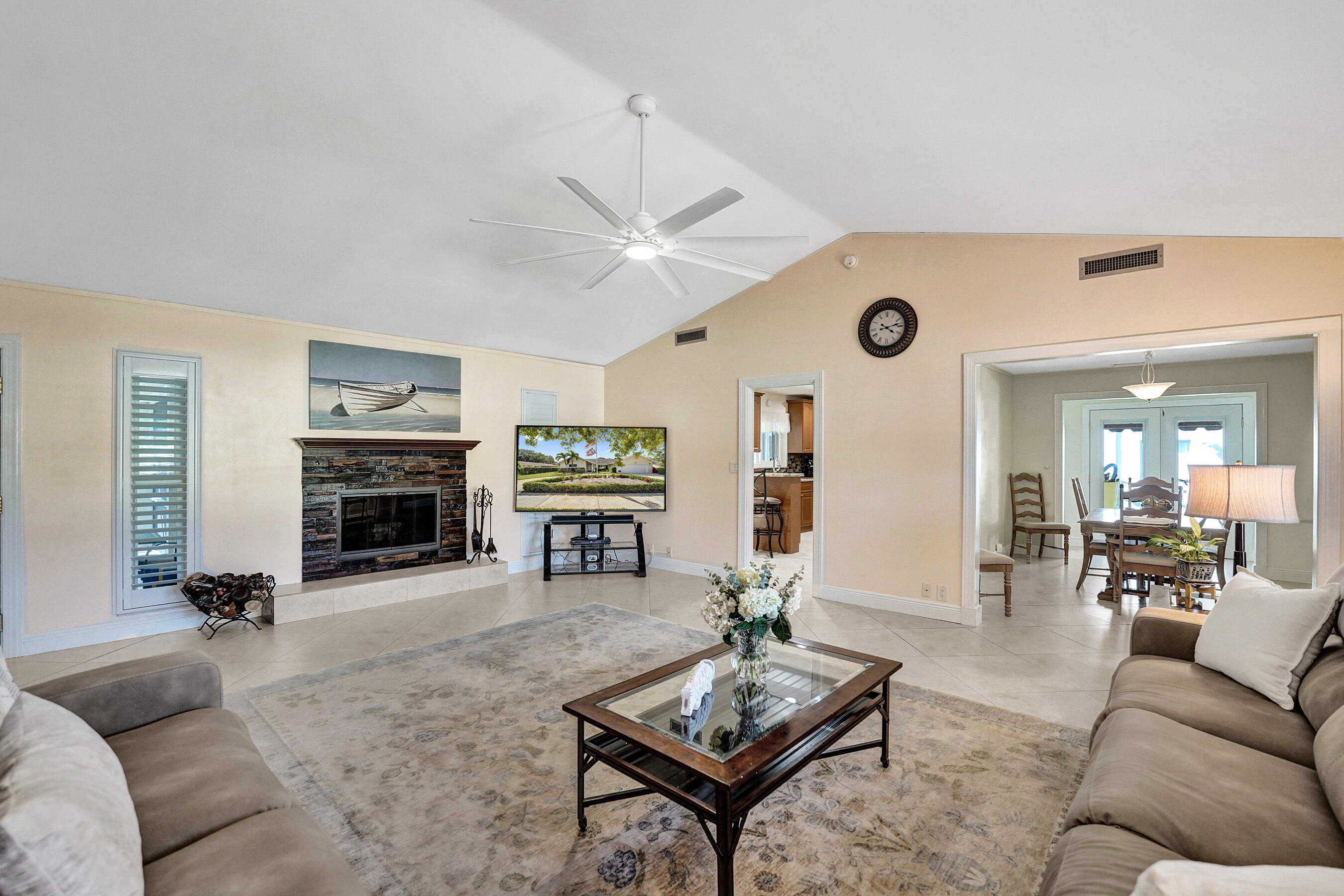 5181 Southwest 89th Terrace Cooper City, FL 33328 - Photo 20 of 56 a living room with furniture a fireplace and a large window