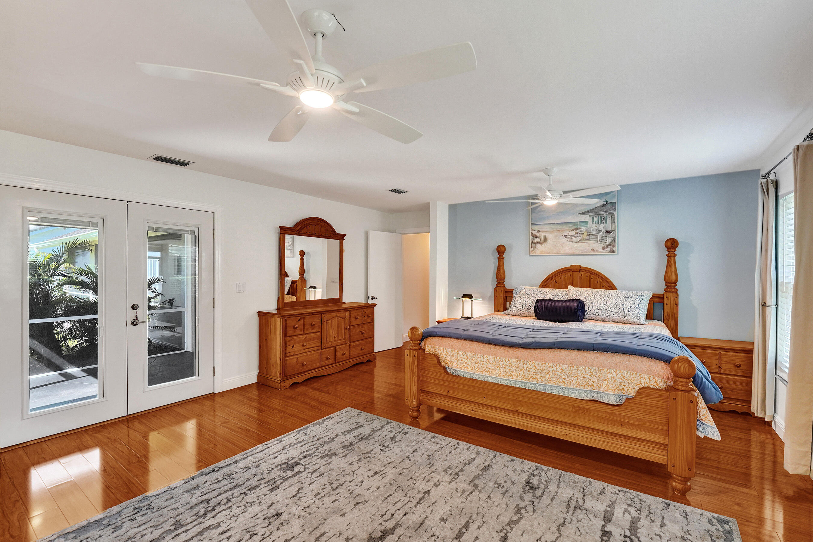 5181 Southwest 89th Terrace Cooper City, FL 33328 - Photo 22 of 56 a bedroom with furniture and a wooden floor