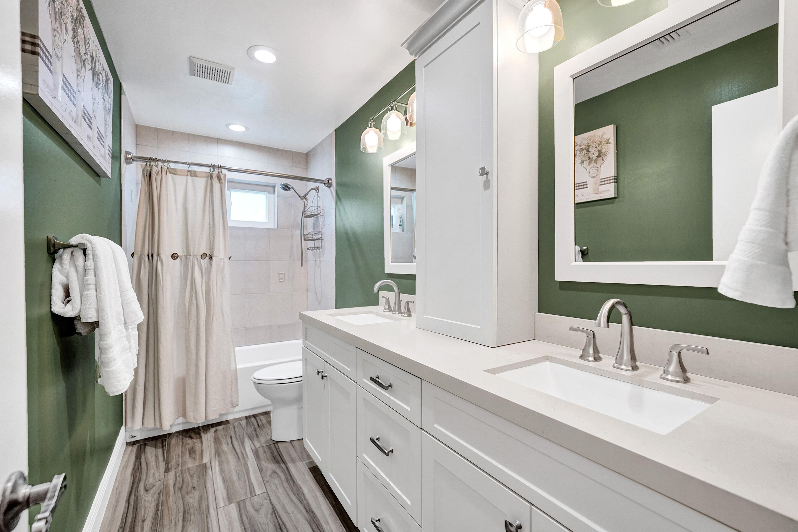 5181 Southwest 89th Terrace Cooper City, FL 33328 - Photo 28 of 56 a bathroom with a double vanity sink mirror and shower