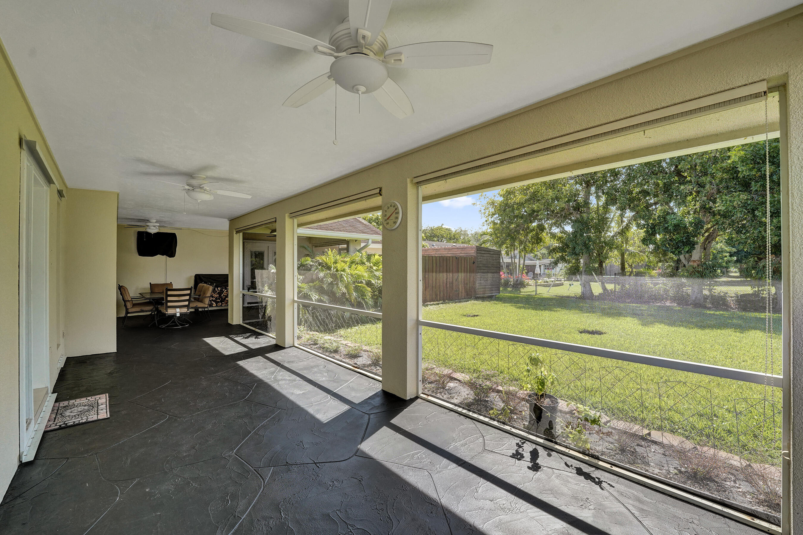 5181 Southwest 89th Terrace Cooper City, FL 33328 - Photo 38 of 56 a view of a porch with furniture and garden