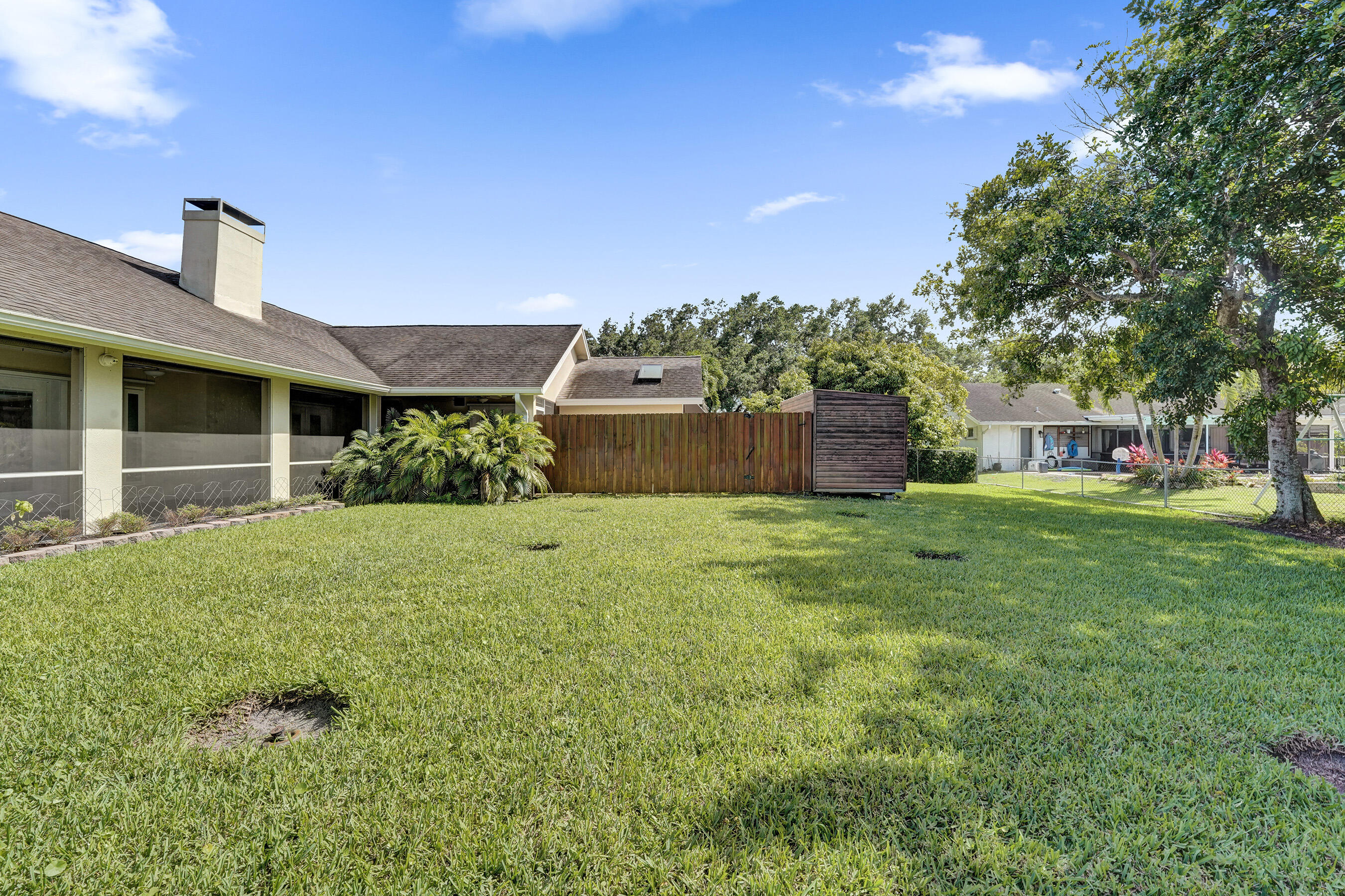 5181 Southwest 89th Terrace Cooper City, FL 33328 - Photo 42 of 56 a front view of a house with a yard and garage