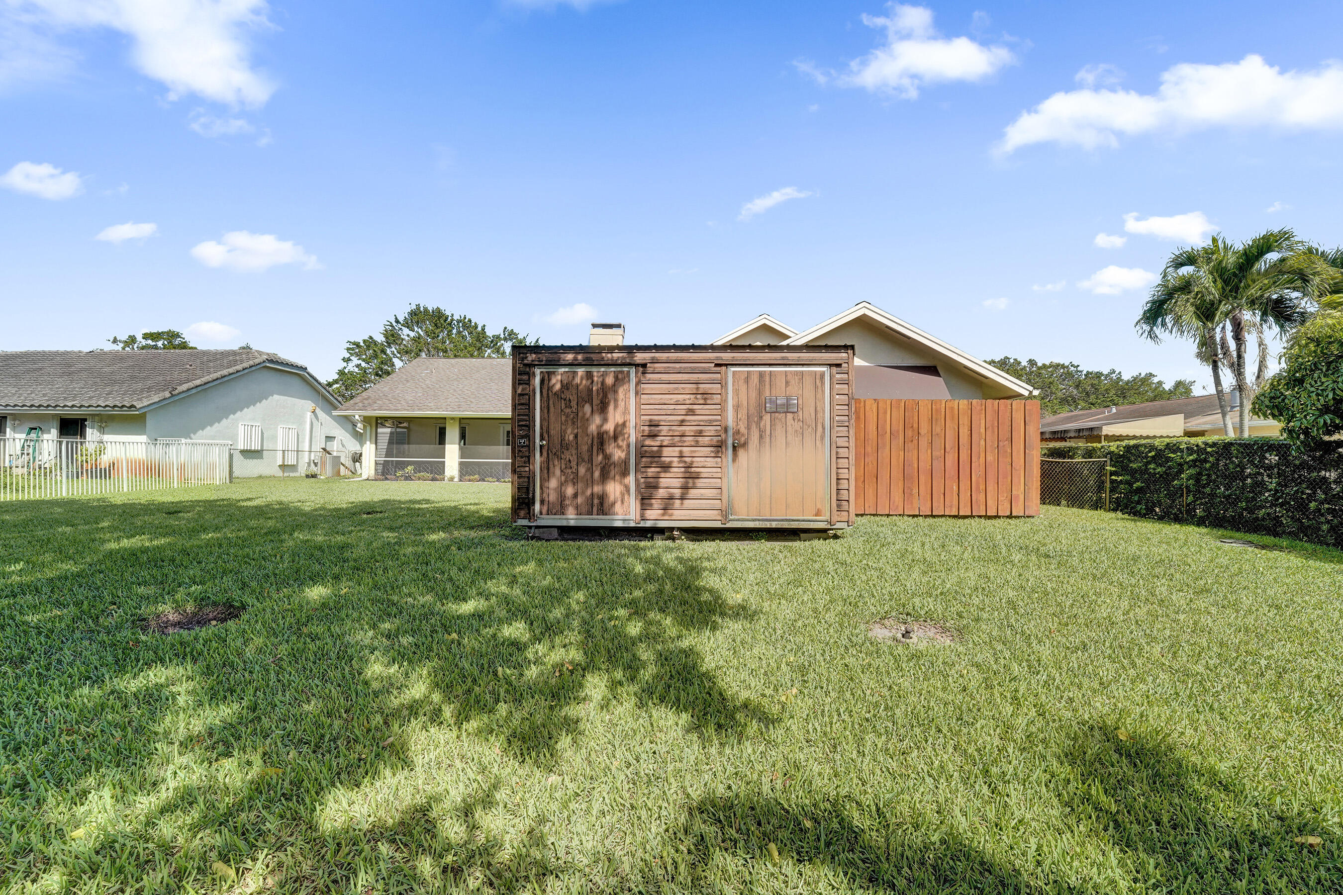 5181 Southwest 89th Terrace Cooper City, FL 33328 - Photo 43 of 56 a view of front of house with a yard
