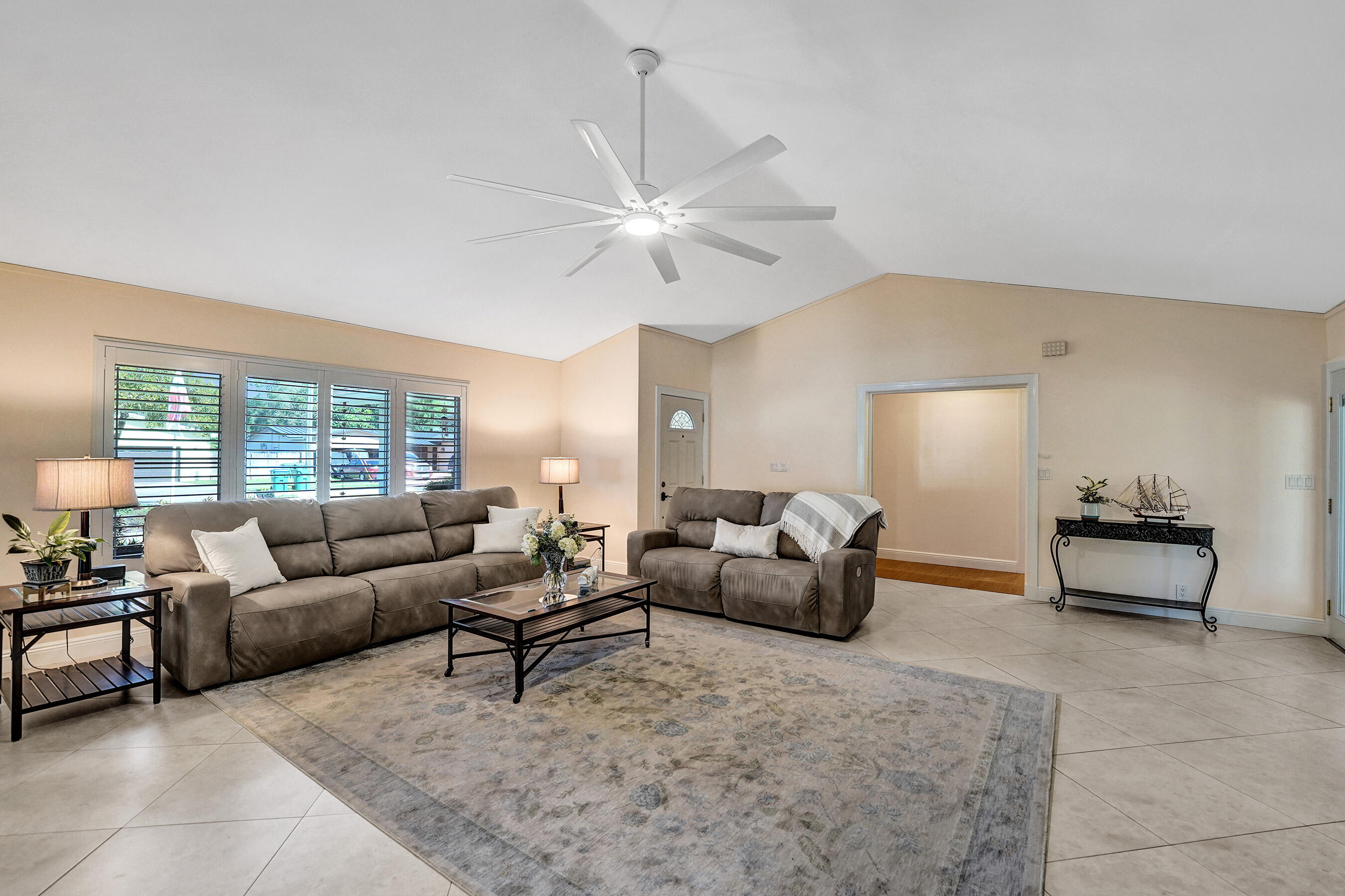 5181 Southwest 89th Terrace Cooper City, FL 33328 - Photo 7 of 56 a living room with furniture and a large window