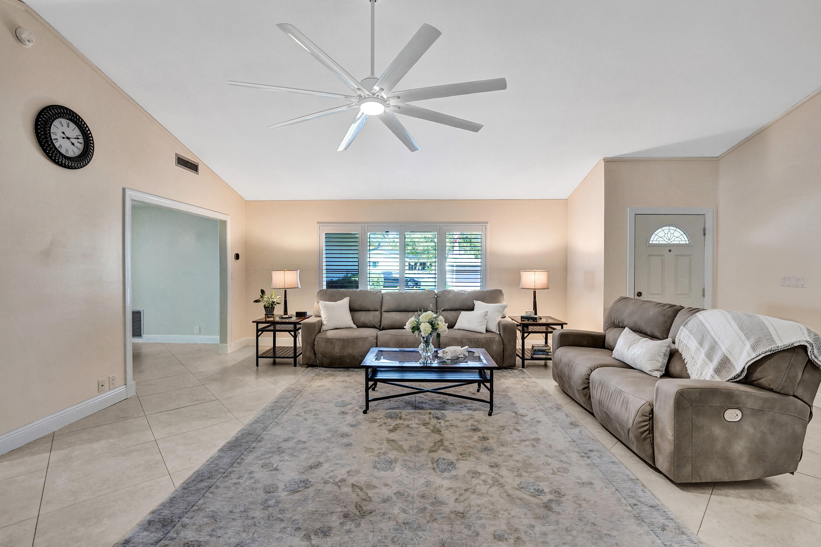 5181 Southwest 89th Terrace Cooper City, FL 33328 - Photo 9 of 56 a living room with furniture and a large window