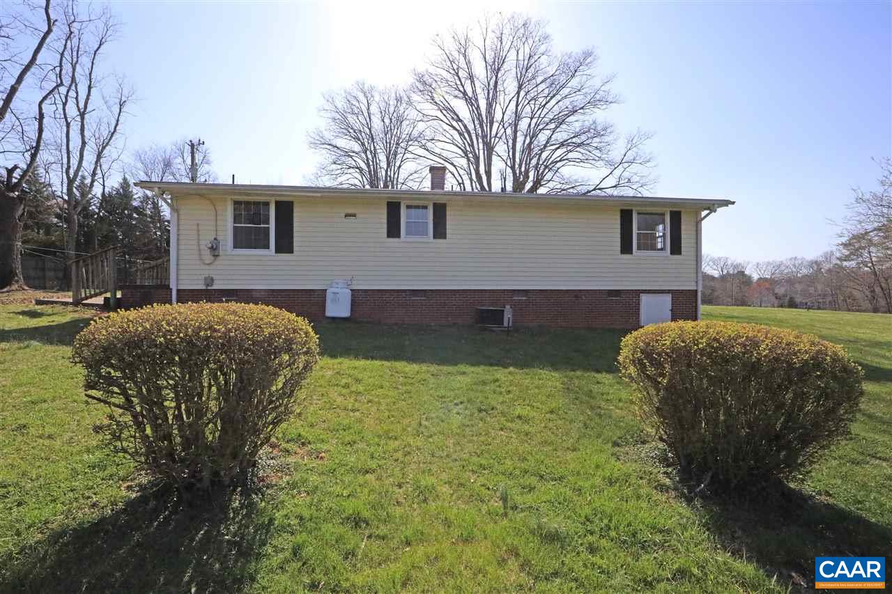 869 Black Cat Road Keswick, VA 22947 - Photo 15 of 20 a front view of a house with garden