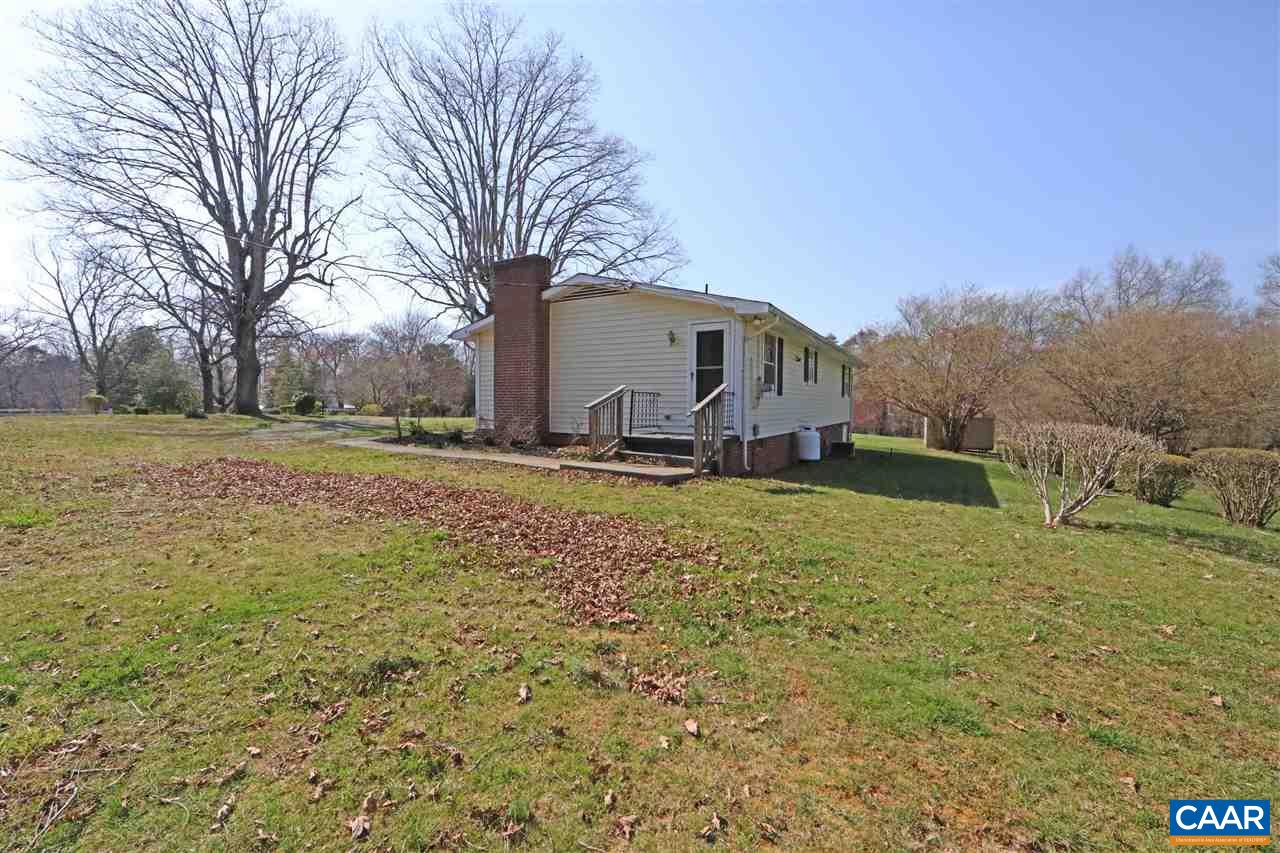 869 Black Cat Road Keswick, VA 22947 - Photo 16 of 20 a house view with a backyard space