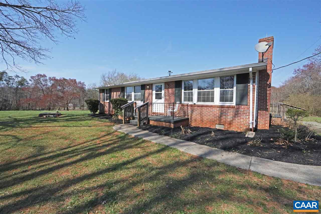 869 Black Cat Road Keswick, VA 22947 - Photo 3 of 20 a view of a house with a yard