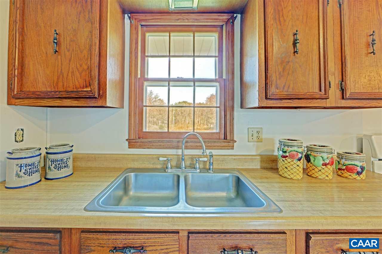 869 Black Cat Road Keswick, VA 22947 - Photo 6 of 20 a kitchen with sink and a window