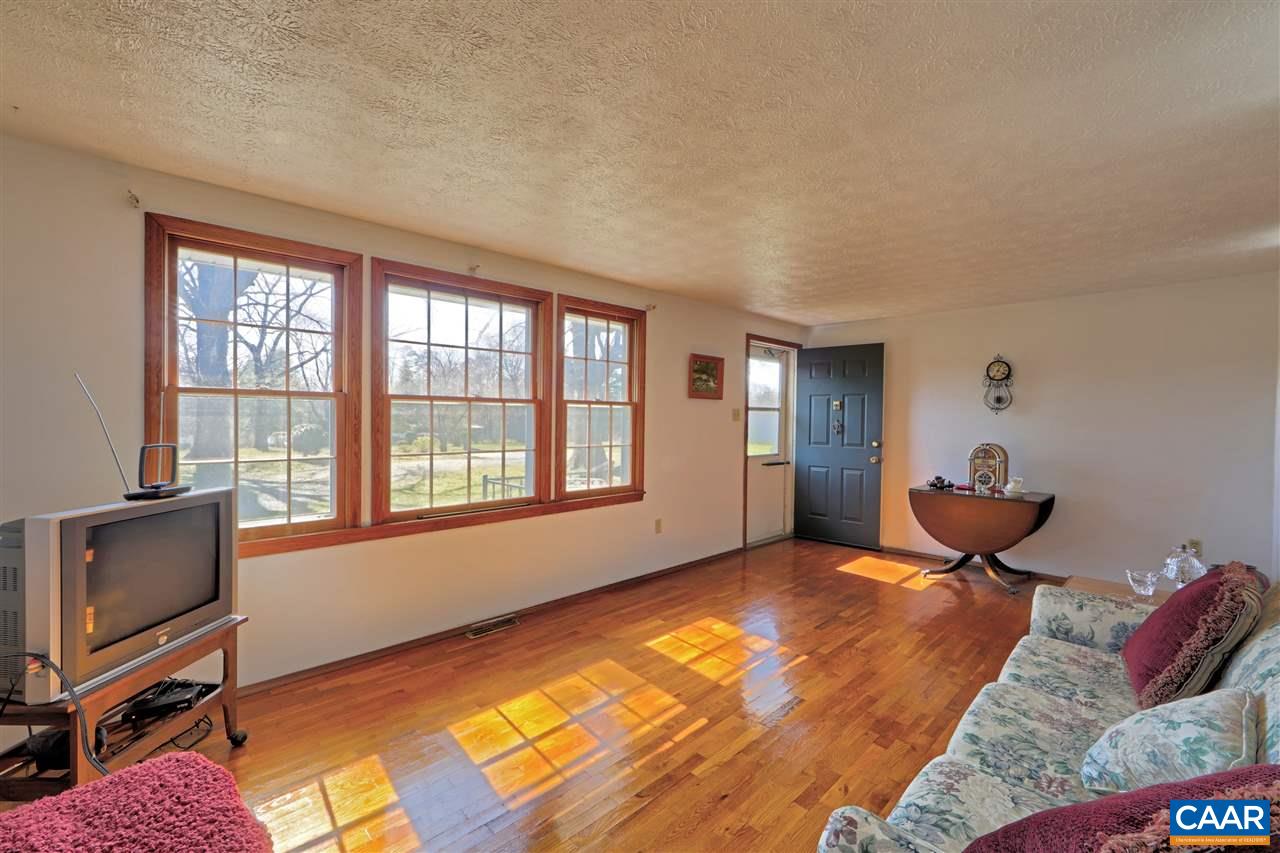 869 Black Cat Road Keswick, VA 22947 - Photo 10 of 20 a bedroom with furniture and a window