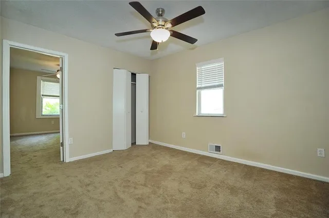 an empty room that has a window