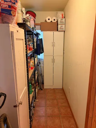 a view of a storage & utility room with stuff