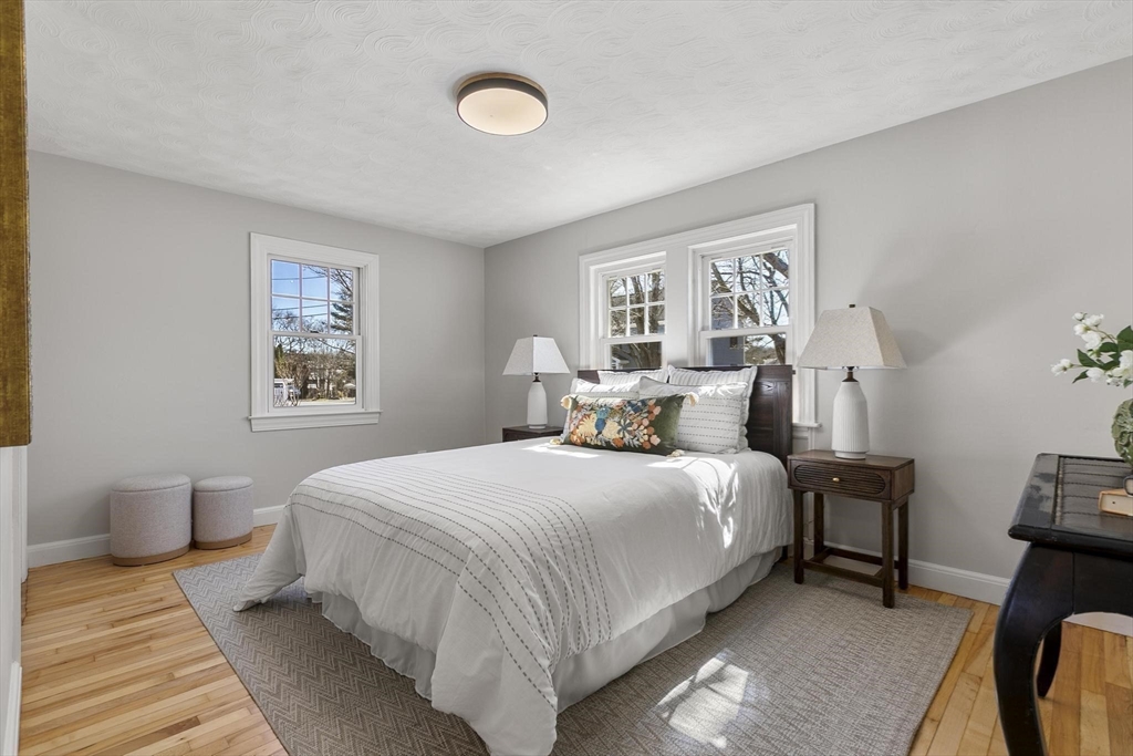 8 Crosby Road Reading, MA 01867 - Photo 15 of 30 a bedroom with a bed and a window