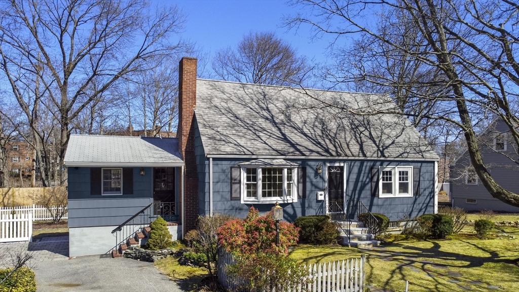 8 Crosby Road Reading, MA 01867 - Photo 2 of 30 a front view of a house with a yard