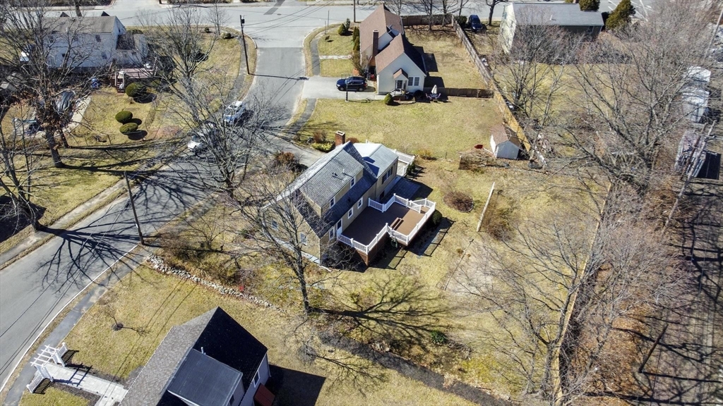 8 Crosby Road Reading, MA 01867 - Photo 25 of 30 an aerial view of a house with a yard
