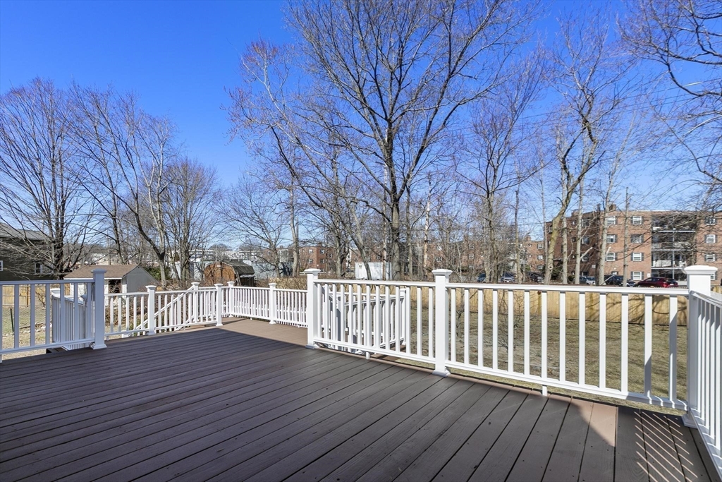 8 Crosby Road Reading, MA 01867 - Photo 27 of 30 a view of a wooden deck