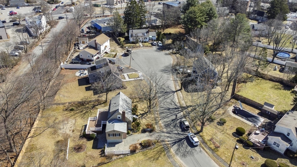 8 Crosby Road Reading, MA 01867 - Photo 3 of 30 an aerial view of residential houses with outdoor space