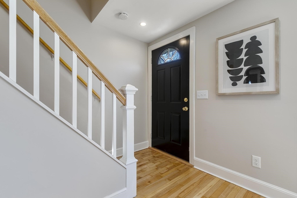 8 Crosby Road Reading, MA 01867 - Photo 4 of 30 a view of an entryway with wooden floor