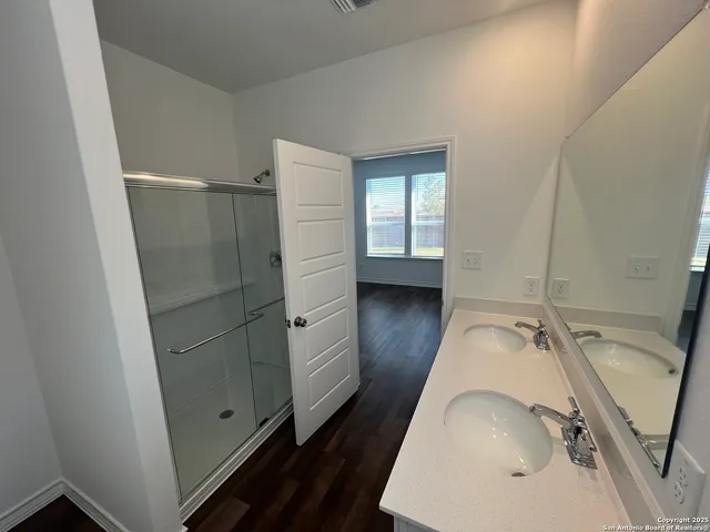 a bathroom with a sink and a tub