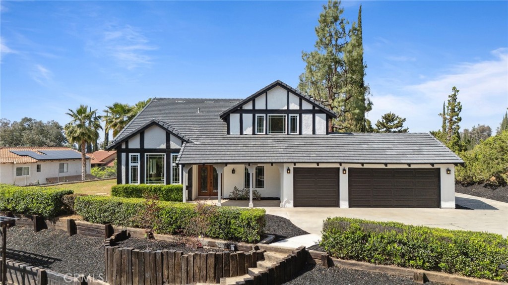 529 Manzanita Road Redlands, CA 92373 - Photo 1 of 64 front view of a house with a yard