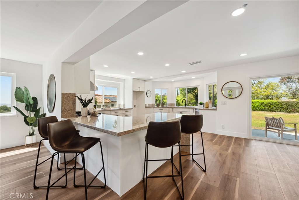 529 Manzanita Road Redlands, CA 92373 - Photo 13 of 64 a view of a dining room with furniture window and wooden floor