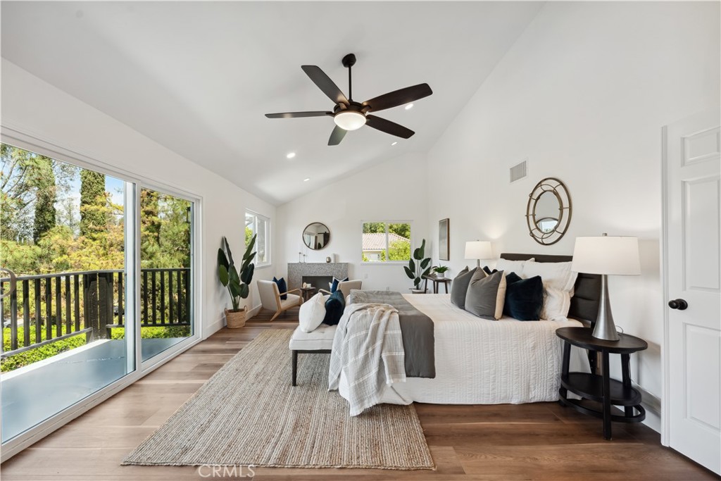 529 Manzanita Road Redlands, CA 92373 - Photo 38 of 64 a living room with furniture a clock and a large window