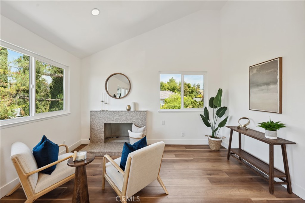 529 Manzanita Road Redlands, CA 92373 - Photo 39 of 64 a living room with furniture a window and a fireplace