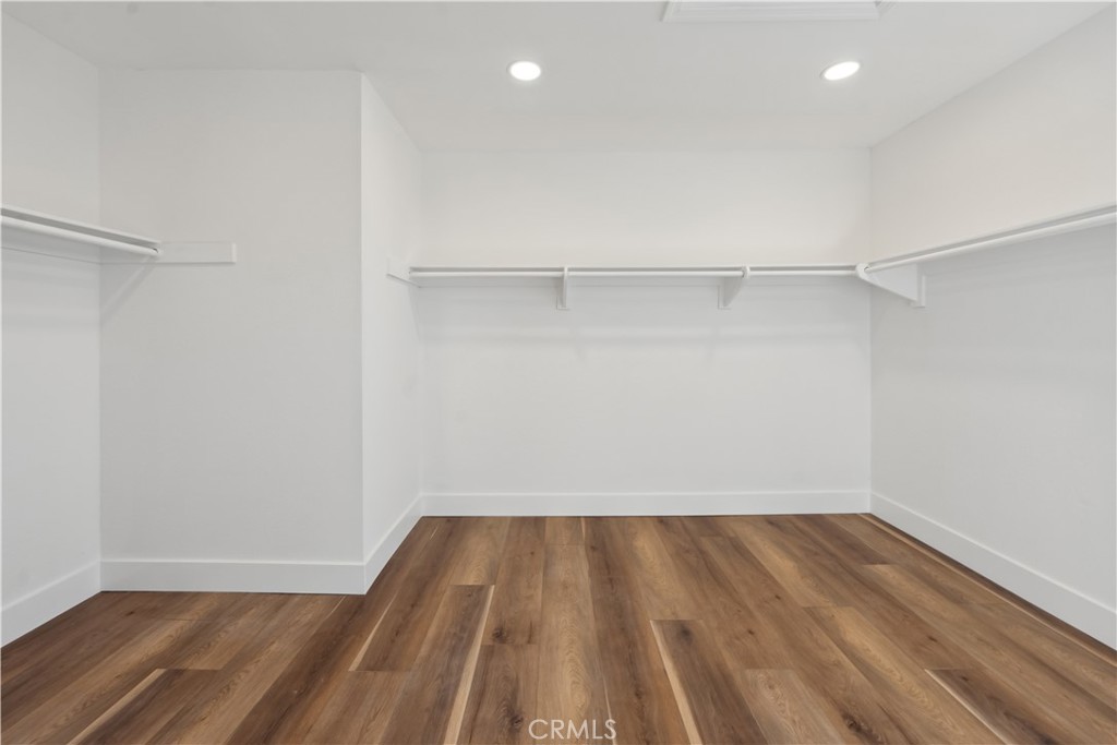 529 Manzanita Road Redlands, CA 92373 - Photo 40 of 64 a view of a room with wooden floor and white walls