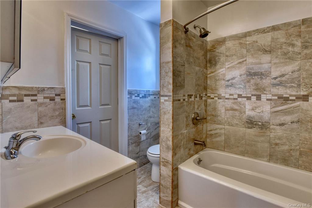 10 Maple Avenue, Unit 1 Fallsburg, NY 12789 - Photo 14 of 25 Recently remodeled primary bathroom.
