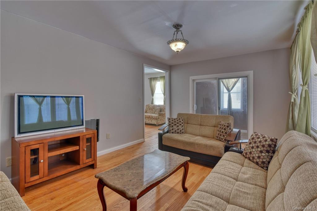 10 Maple Avenue, Unit 1 Fallsburg, NY 12789 - Photo 9 of 25 Large, entertaining living room.