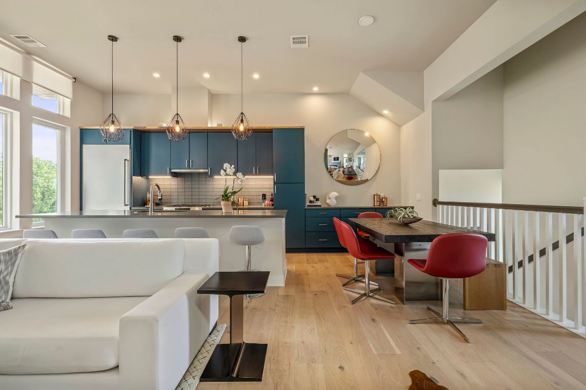 2300 Enfield Road, Unit 302 Austin, TX 78703 - Photo 1 of 26 a kitchen with a sink cabinets and dining table