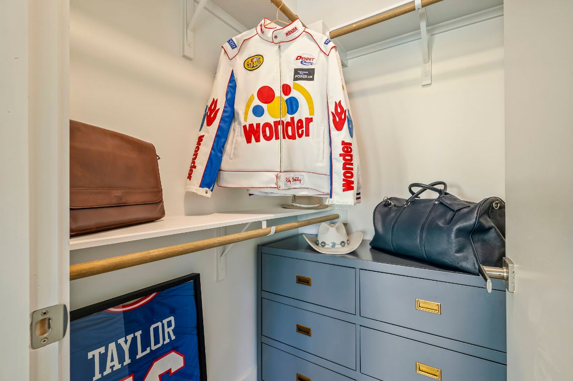 2300 Enfield Road, Unit 302 Austin, TX 78703 - Photo 19 of 26 a kitchen with a cabinets and a bed