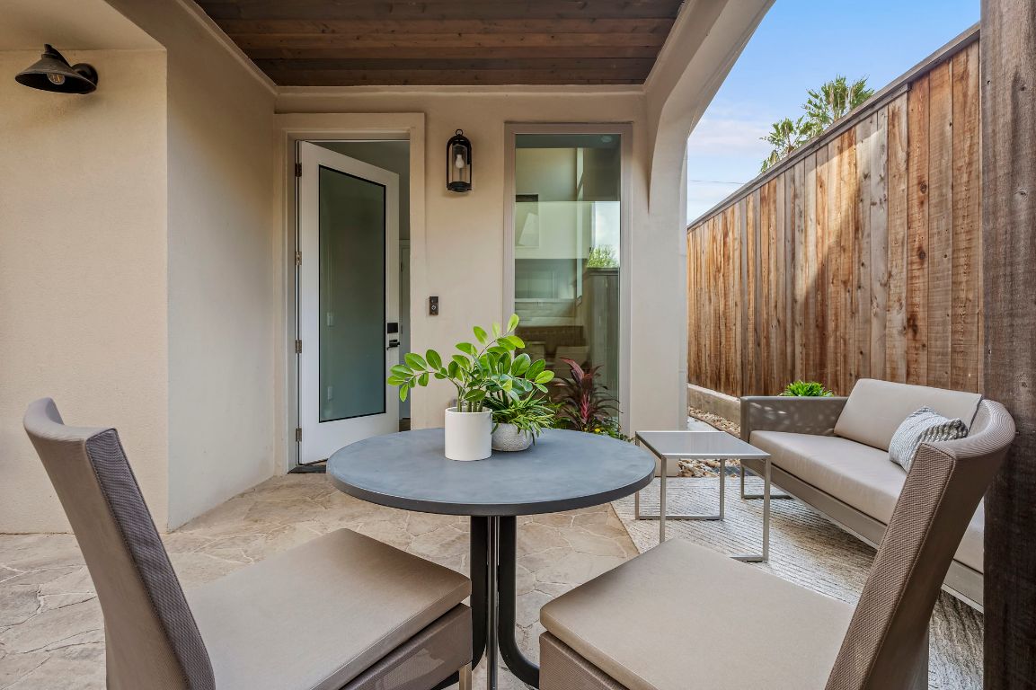 2300 Enfield Road, Unit 302 Austin, TX 78703 - Photo 21 of 26 a view of a livingroom with furniture and a potted plant