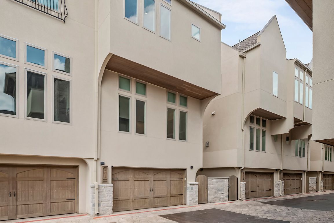 2300 Enfield Road, Unit 302 Austin, TX 78703 - Photo 24 of 26 a front view of residential houses with stairs