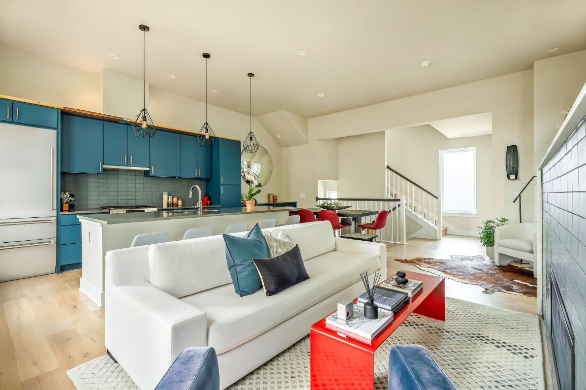 2300 Enfield Road, Unit 302 Austin, TX 78703 - Photo 3 of 26 a living room with furniture and kitchen view
